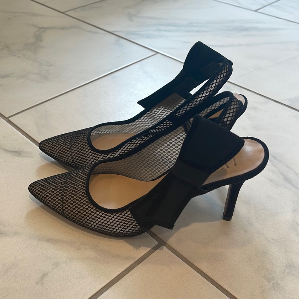 Inc black shoes.